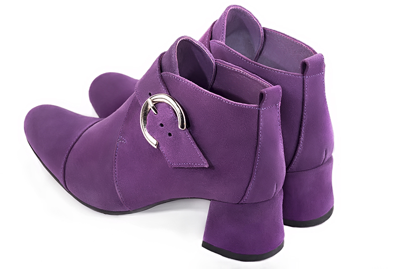 Amethyst purple women's ankle boots with buckles at the front. Round toe. Low flare heels. Rear view - Florence KOOIJMAN